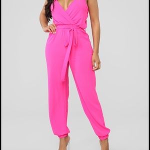 Fuchsia spaghetti strap jumpsuit.